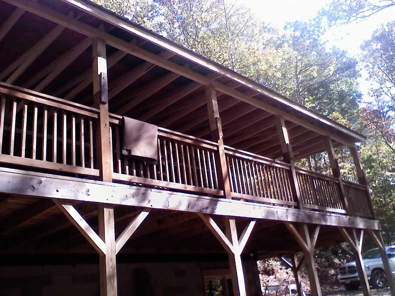 Timber framing under a new elevated porch and deck — Roof Leak Repair in Janesville by Roofing Brothers